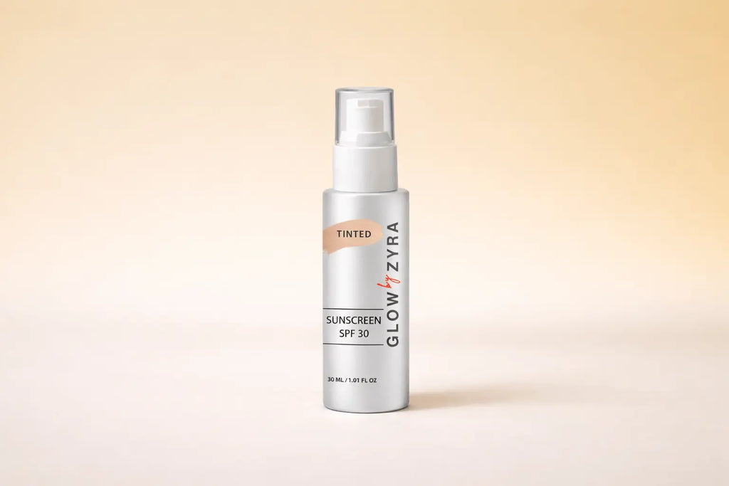 Glow Zyra sunscreen spray bottle on a beige background