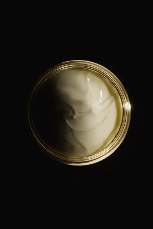 Jar of white cream on a black background