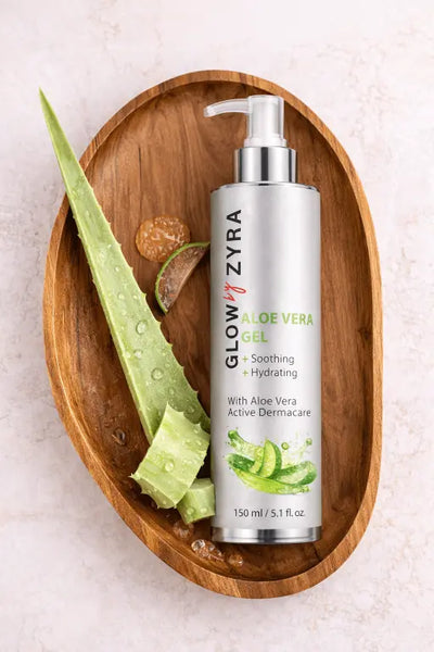 Zyra Aloe Vera gel bottle on a wooden tray with aloe vera leaves