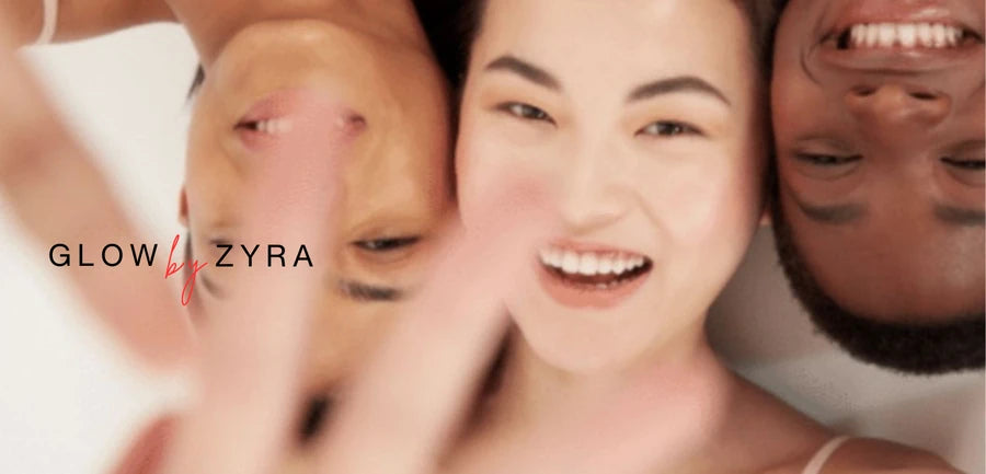 Three people with glowing skin smiling, with 'Glow by Zyra' branding.