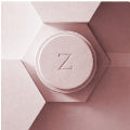 Close-up of a pink cosmetic product with a 'Z' logo on a geometric background